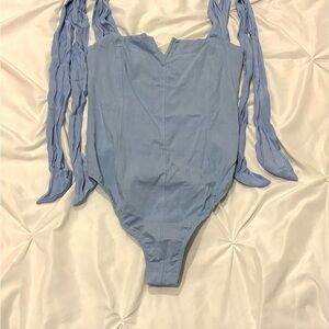 Woman’s free people bodysuit NEVER WORN!!!